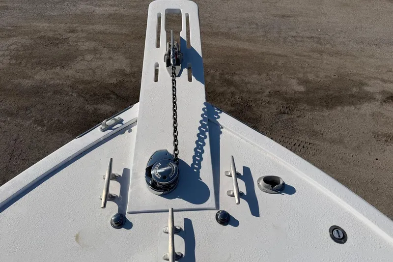 Slide: The Image of Bow of 1984 Ocean Yachts 55 Super Sport with anchor chain and cleats. - 48