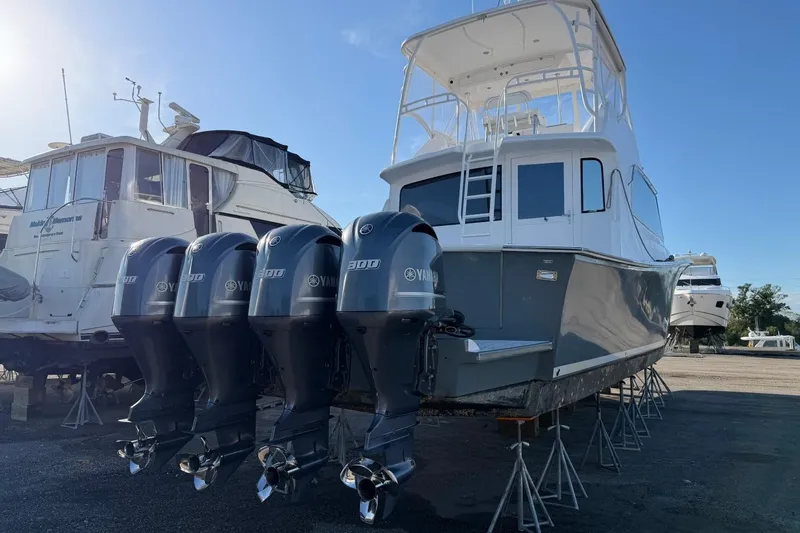 Slide: The Image of 1984 Ocean Yachts 55 Super Sport with Yamaha outboard engines on display. - 5