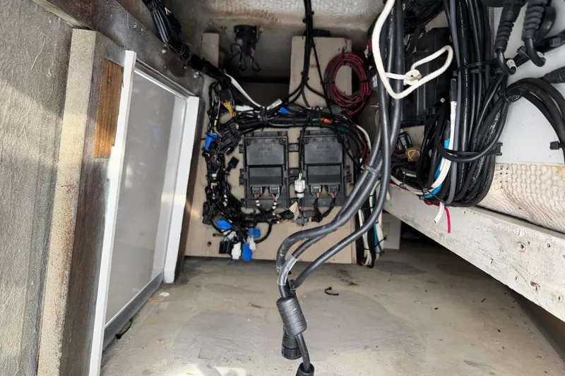 Slide: The Image of Electrical wiring and components inside a 1984 Ocean Yachts 55 Super Sport boat. - 59