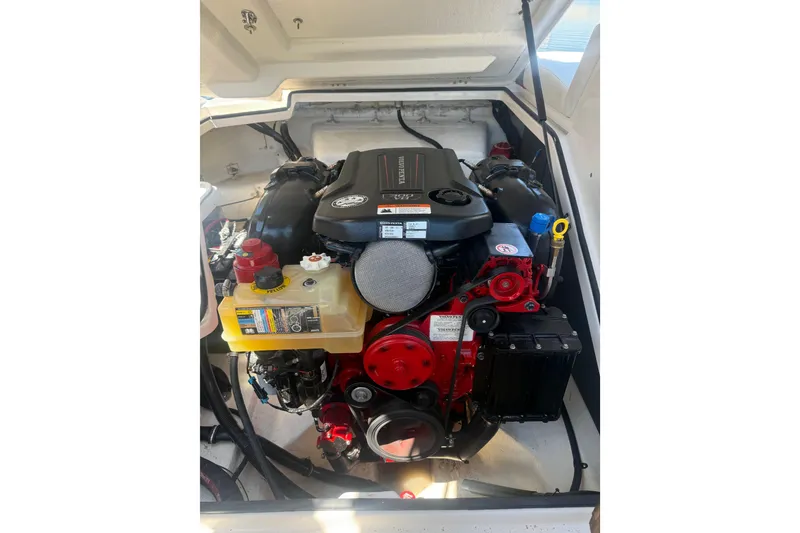 Slide: The Image of Engine compartment of a 2017 Regal 24 FasDeck boat, showcasing detailed components. - 8