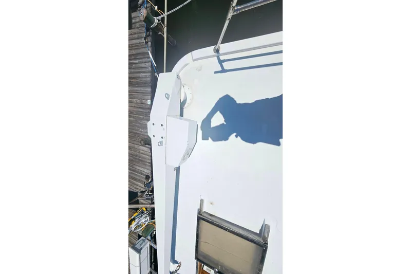 Slide: The Image of Overhead view of 1981 Sea Ranger 47 Pilothouse deck with shadow and railing. - 32