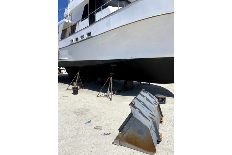 Slide: The Image of 1981 Sea Ranger 47 Pilothouse yacht on dry dock for maintenance. - 50