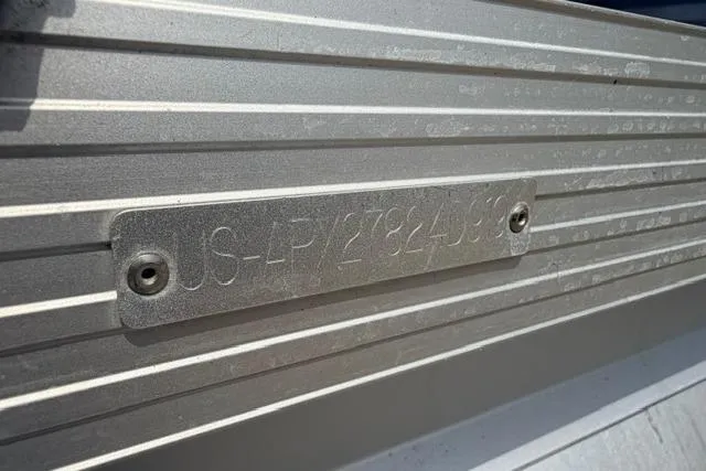 Slide: The Image of 2019 Quest Adventure 818 boat hull identification number plate. - 8