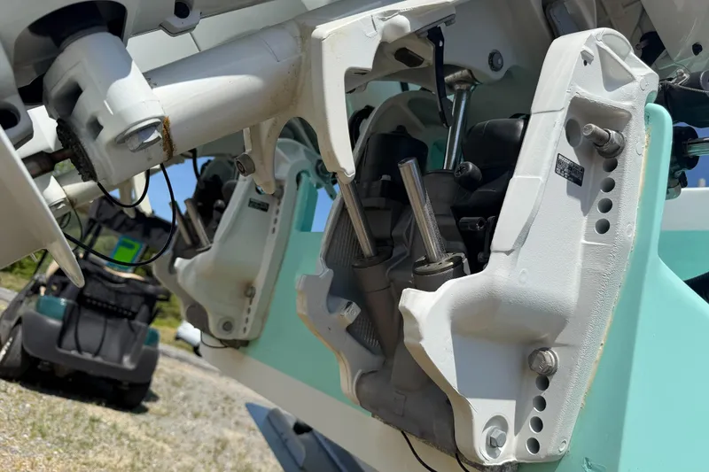 Slide: The Image of Close-up of a 1974 Boca Grande Passmaster 26 boat engine components. - 5