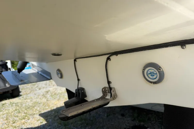 Slide: The Image of 1974 Boca Grande Passmaster 26 boat hull with trim tabs and drain plug. - 7