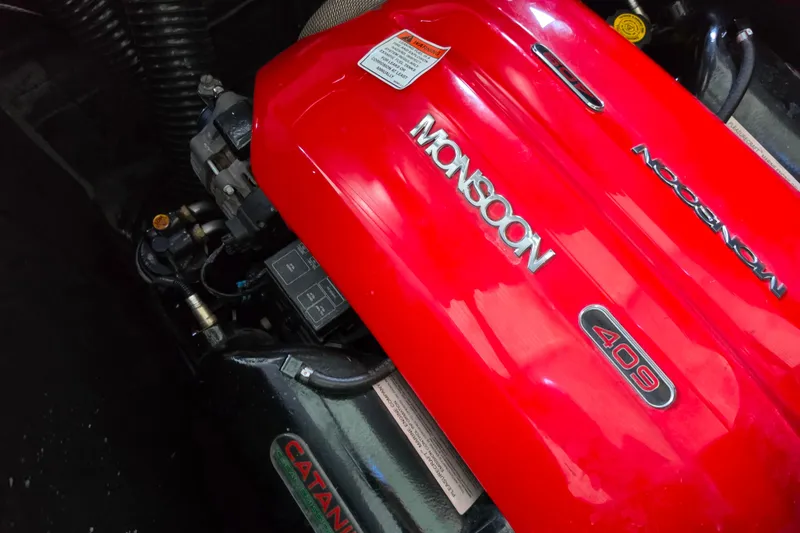 Slide: The Image of Red Monsoon 409 engine in a 2017 Axis T23 boat. - 23