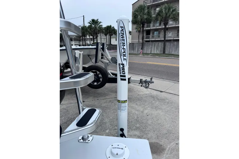 Slide: The Image of 2016 East Cape Fury boat with Power-Pole Pro II anchor system on concrete surface. - 34
