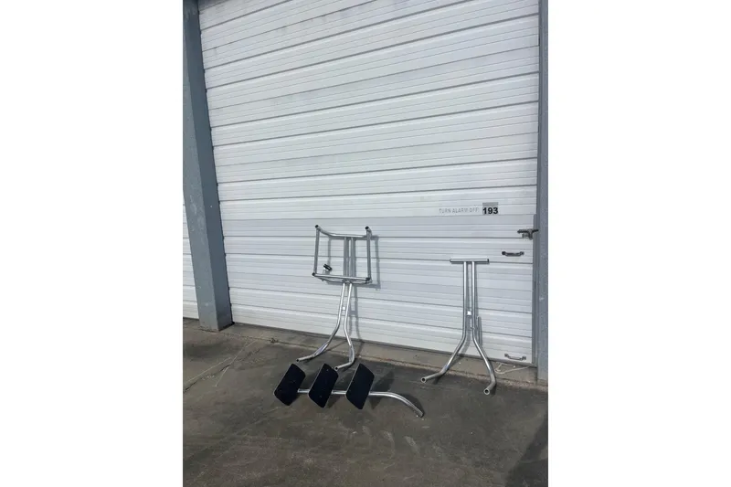 Slide: The Image of Boat accessories for 2016 East Cape Fury displayed against a garage door. - 36