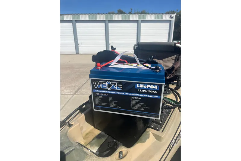 Slide: The Image of Weize LiFePO4 battery on 2016 East Cape Fury boat, outdoor storage background. - 40