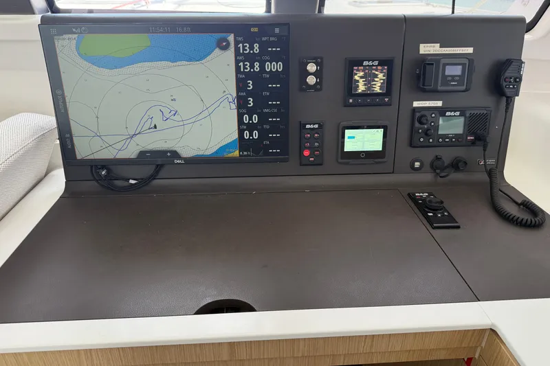 Slide: The Image of Navigation console of 2022 Outremer 51 catamaran with advanced B&G electronics and chart display. - 17