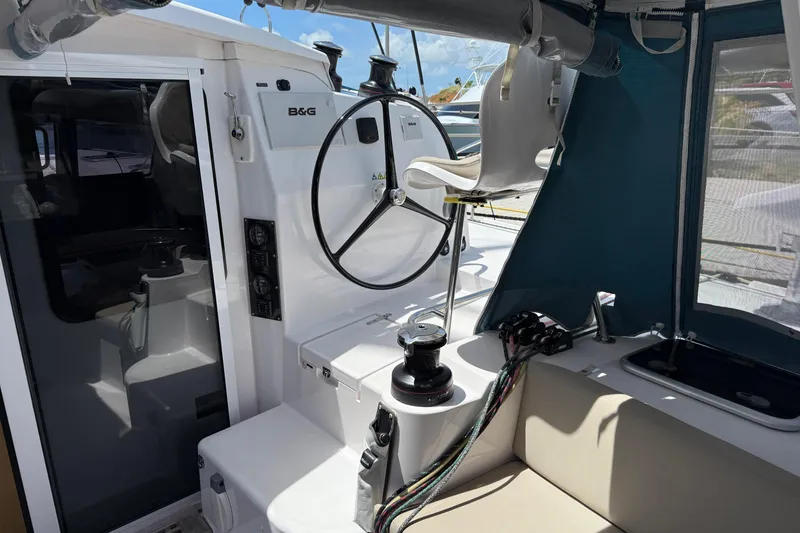 Slide: The Image of 2022 Outremer 51 yacht cockpit with steering wheel and navigation equipment. - 7
