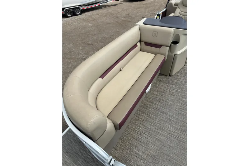 Slide: The Image of 2022 Godfrey Sweetwater 2286 SB boat with beige and maroon seating. - 10