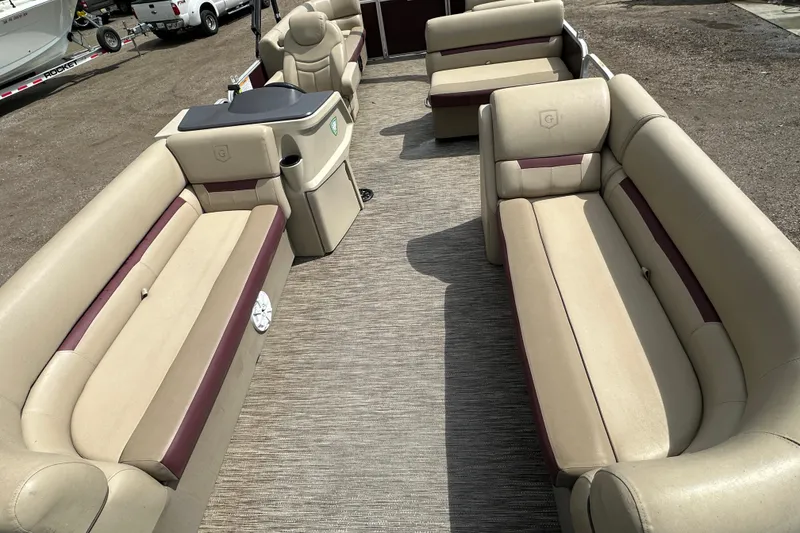 Slide: The Image of Interior of 2022 Godfrey Sweetwater 2286 SB pontoon boat with beige seating. - 12