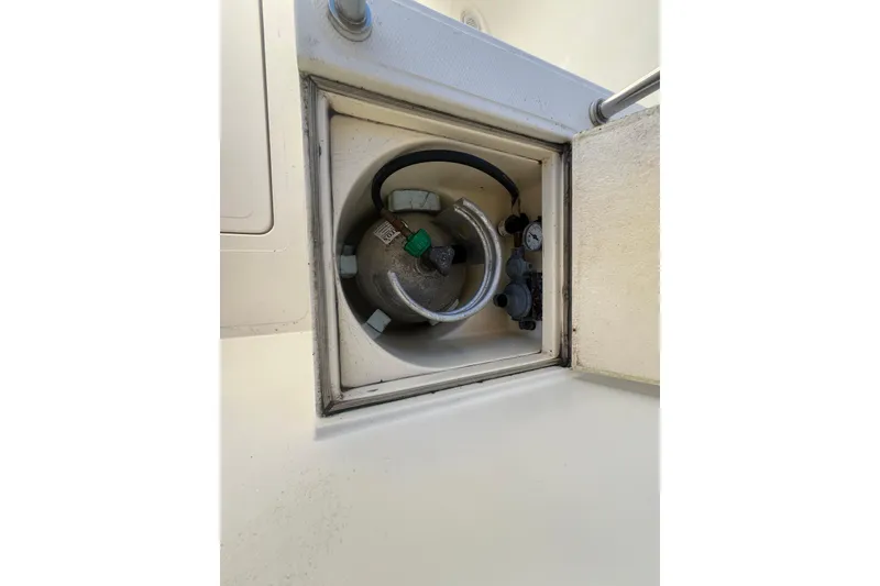 Slide: The Image of Propane tank compartment on a 2005 Camano Trawler boat. - 38