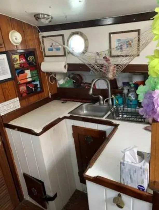 Slide: The Image of Compact kitchen on a 1979 Colvin Gazelle boat. - 5