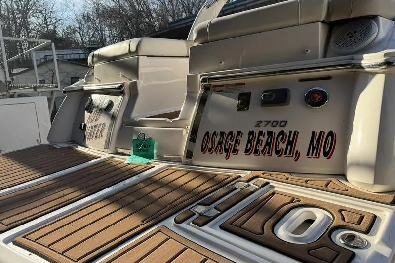 Slide: The Image of 2014 Regal 2700 ES Bowrider boat deck, Osage Beach, MO, with wood finish. - 10