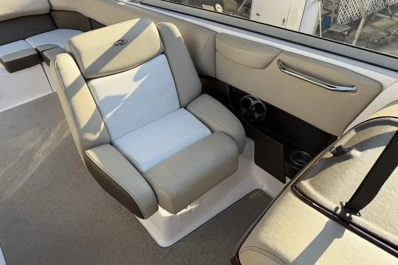 Slide: The Image of Luxurious seating in a 2014 Regal 2700 ES Bowrider boat interior. - 12