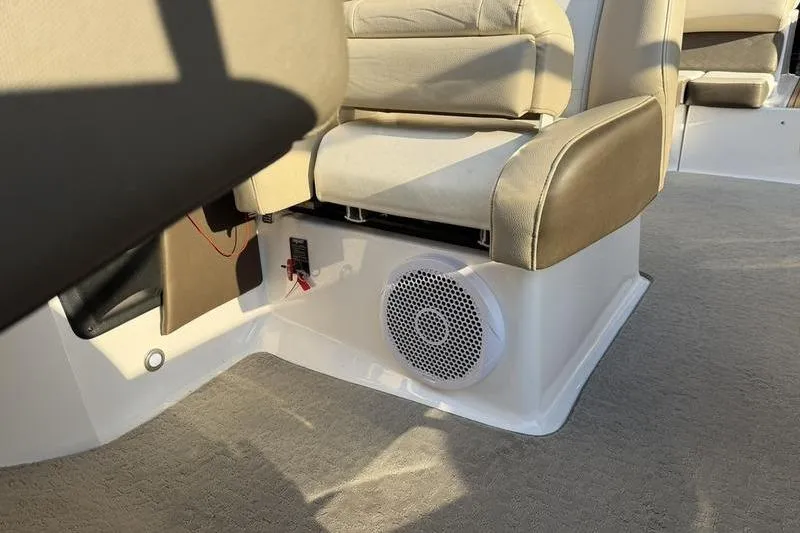 Slide: The Image of Interior of 2014 Regal 2700 ES Bowrider showing seating and speaker system. - 17