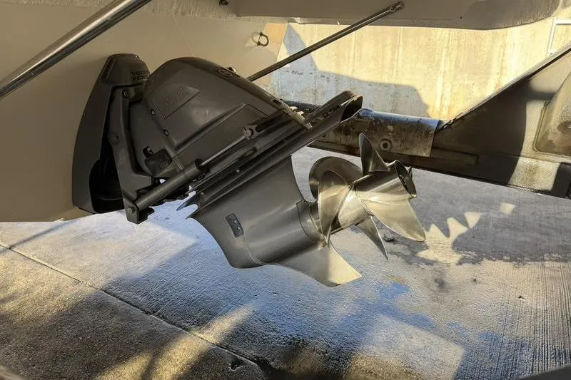 Slide: The Image of 2014 Regal 2700 ES Bowrider boat propeller and drive system close-up. - 24