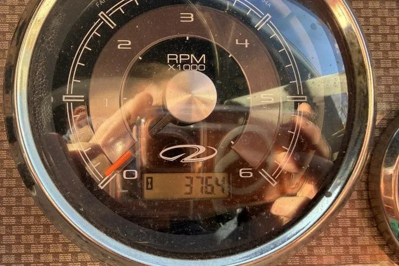 Slide: The Image of Close-up of a 2014 Regal 2700 ES Bowrider tachometer showing 3784 RPM. - 27