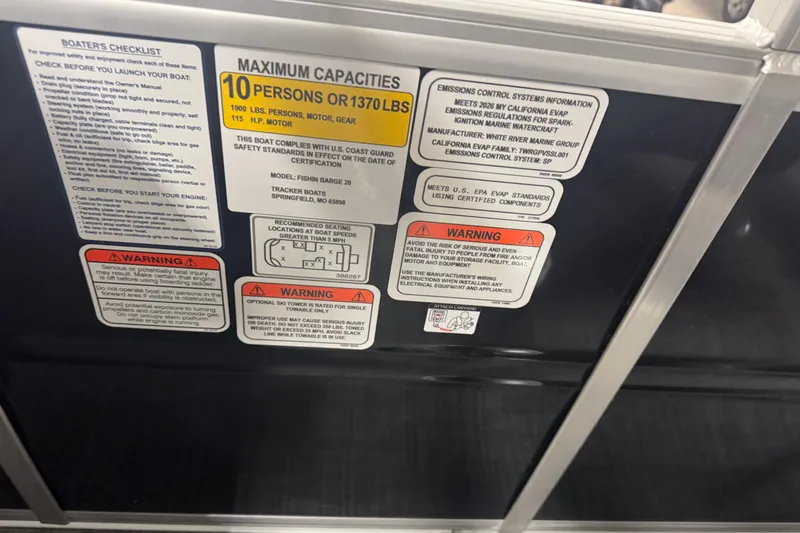 Slide: The Image of Safety and capacity labels on 2026 Sun Tracker Fishin' Barge 20 DLX boat. - 12