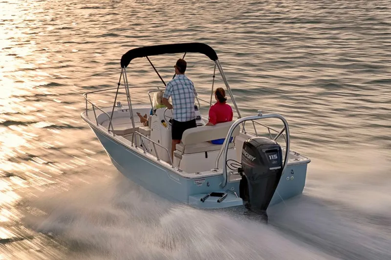 Slide: The Image of Manufacturer Provided Image: 2026 Boston Whaler 170 Montauk boat cruising on water at sunset. - 3