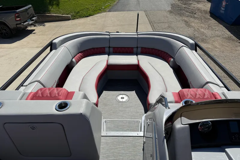 Slide: The Image of 2022 Bennington R 24 Quad Bench Bowrider with spacious seating and modern design. - 10