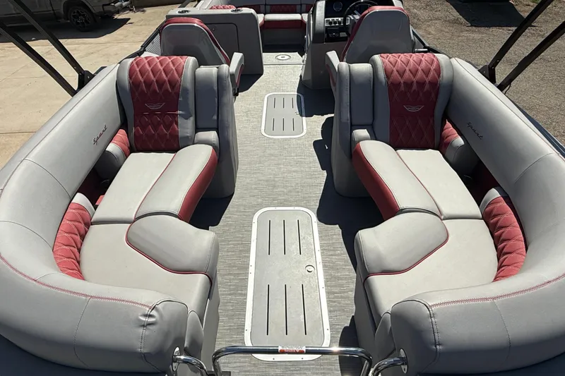 Slide: The Image of Luxurious interior of 2022 Bennington R 24 Quad Bench Bowrider with plush seating. - 19