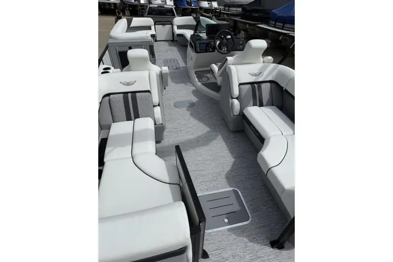 Slide: The Image of Luxurious interior of 2025 Bennington 26 MFB-SPT pontoon boat with plush seating. - 10