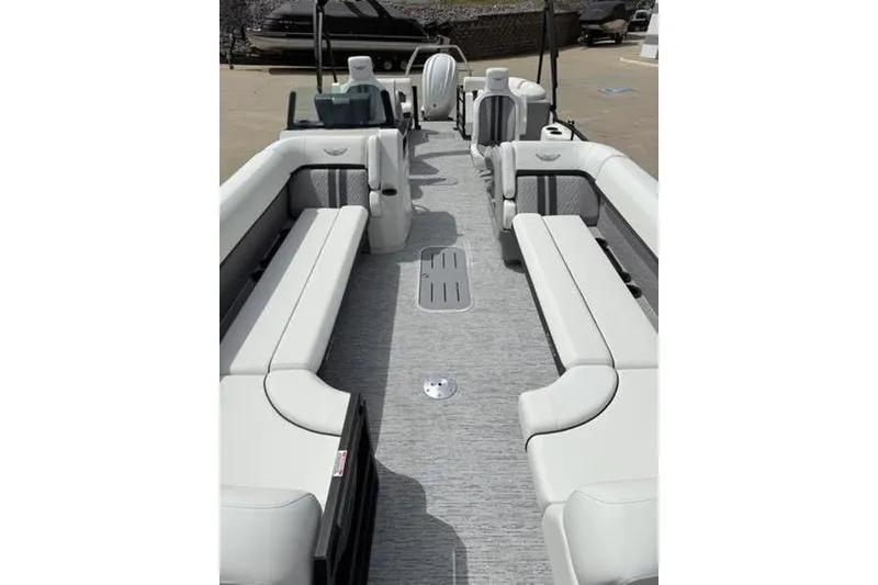 Slide: The Image of 2025 Bennington 26 MFB-SPT pontoon boat with spacious seating and modern design. - 13