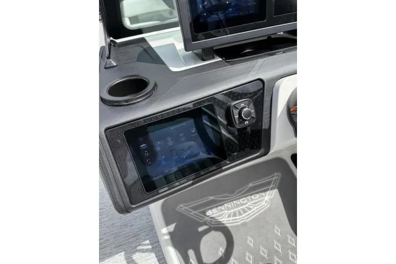 Slide: The Image of Dashboard of 2025 Bennington 26 MFB-SPT boat with touchscreen and control knob. - 18