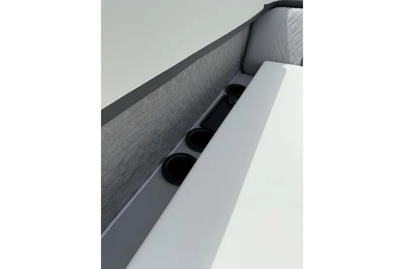 Slide: The Image of Interior seating with cup holders in 2025 Bennington 26 MFB-SPT boat. - 9