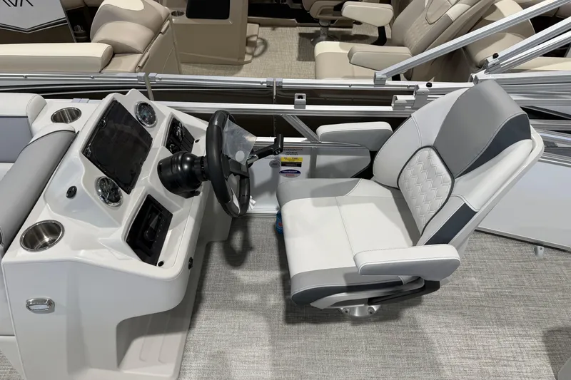 Slide: The Image of 2026 Avalon 2185 VENTURE 85 VRB boat helm with modern steering and comfortable seating. - 5