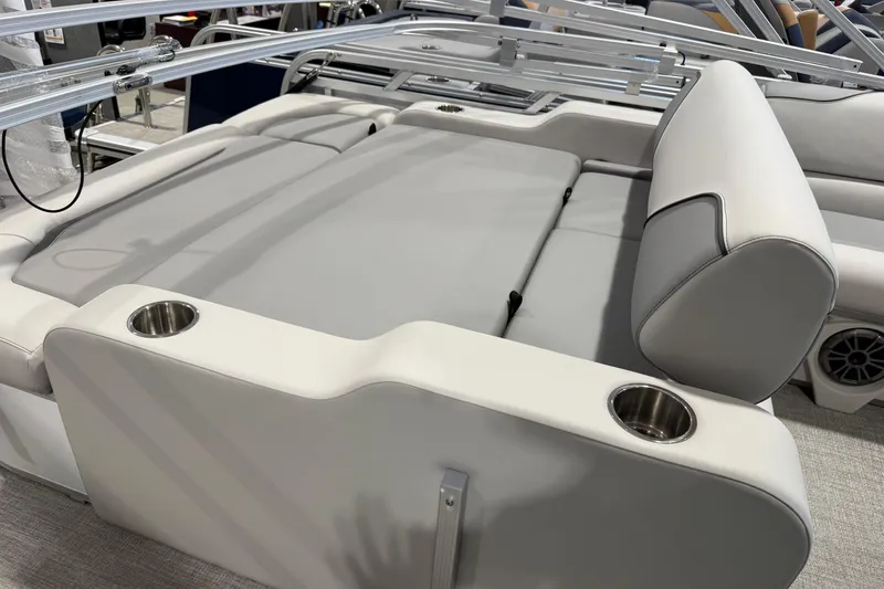 Slide: The Image of 2026 Avalon 2185 VENTURE 85 VRB boat interior with gray seating and cup holders. - 7