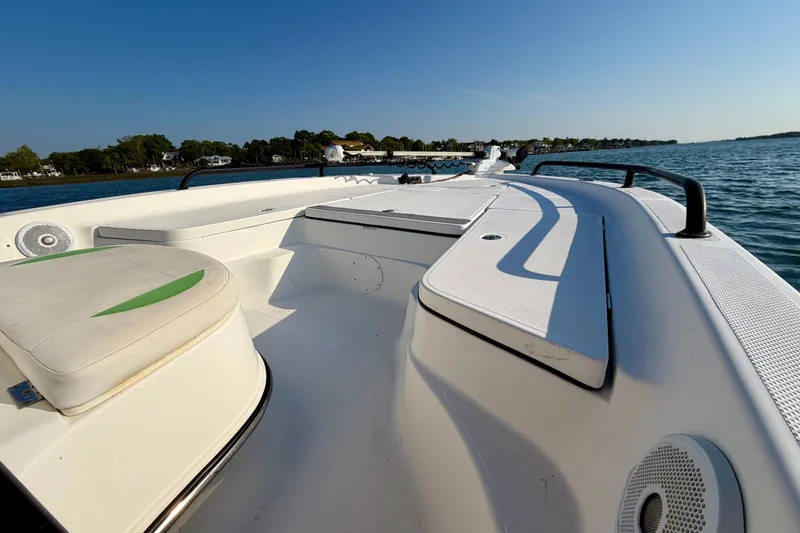 Slide: The Image of 2015 Epic 22 Sport Console boat with Suzuki 175 engine on open water. - 6