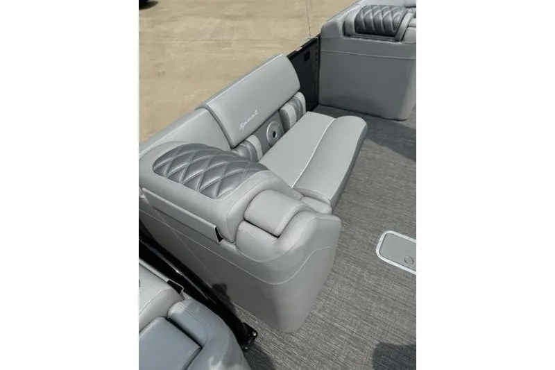 Slide: The Image of Luxurious seating on 2025 Bennington 27 QXFBAT2 pontoon boat, featuring elegant gray upholstery. - 10