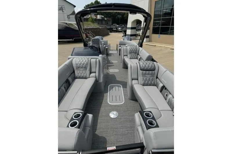 Slide: The Image of 2025 Bennington 27 QXFBAT2 pontoon boat with luxurious seating and modern design. - 15