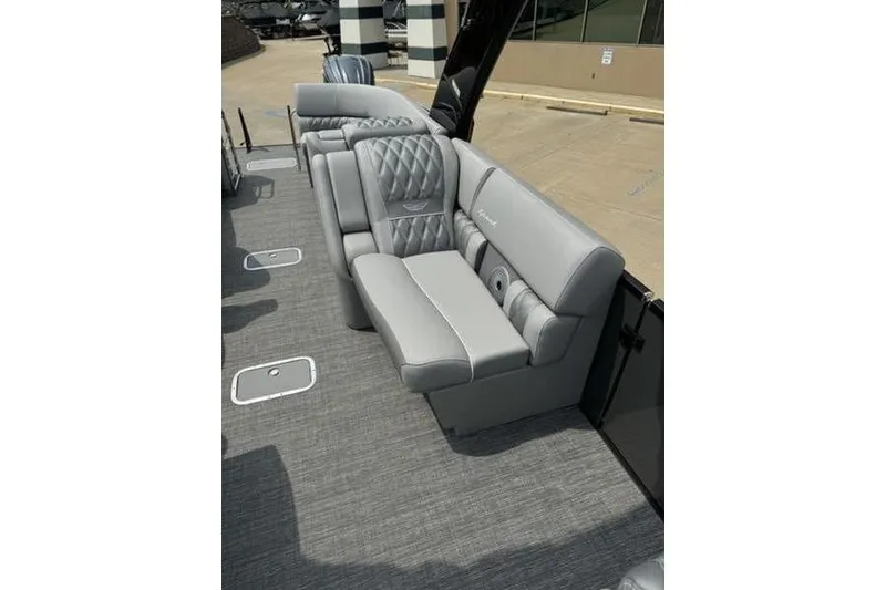 Slide: The Image of Luxurious seating on 2025 Bennington 27 QXFBAT2 boat, featuring elegant gray upholstery. - 16