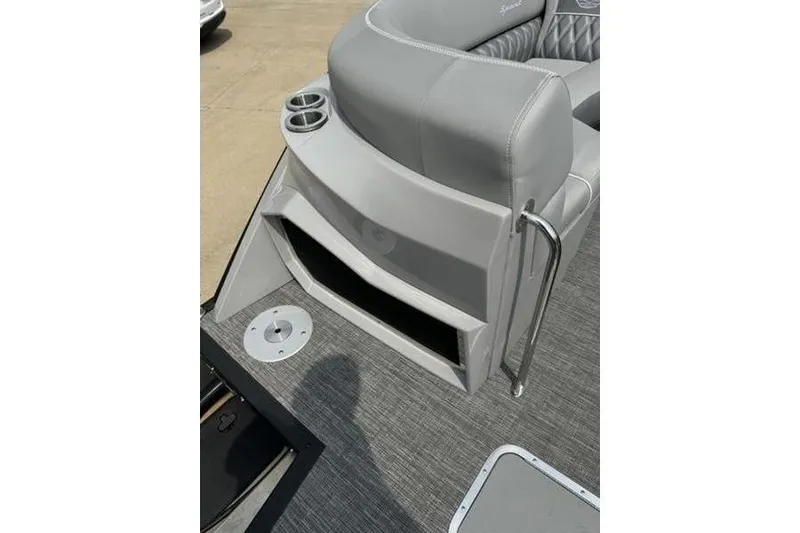 Slide: The Image of 2025 Bennington 27 QXFBAT2 boat interior with gray seating and cup holders. - 20