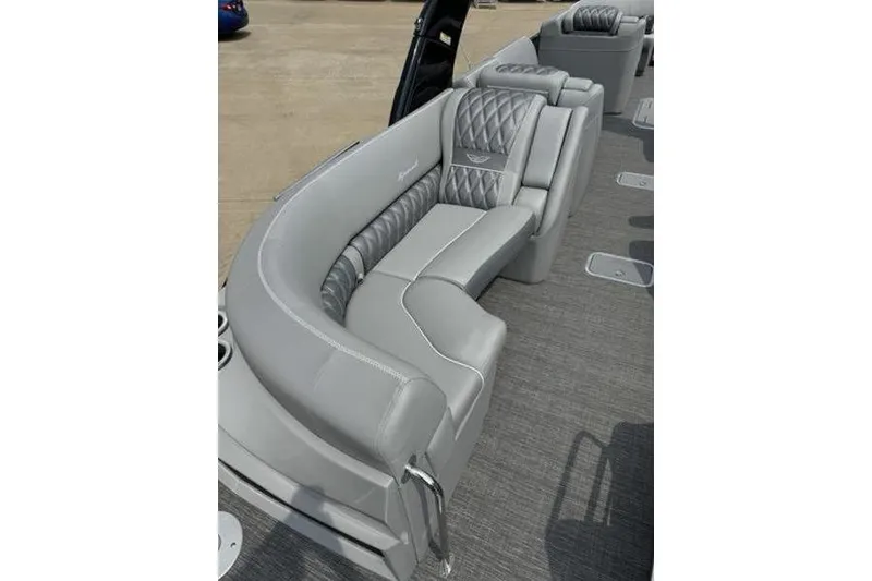 Slide: The Image of Luxurious seating on 2025 Bennington 27 QXFBAT2 pontoon boat with elegant gray upholstery. - 8