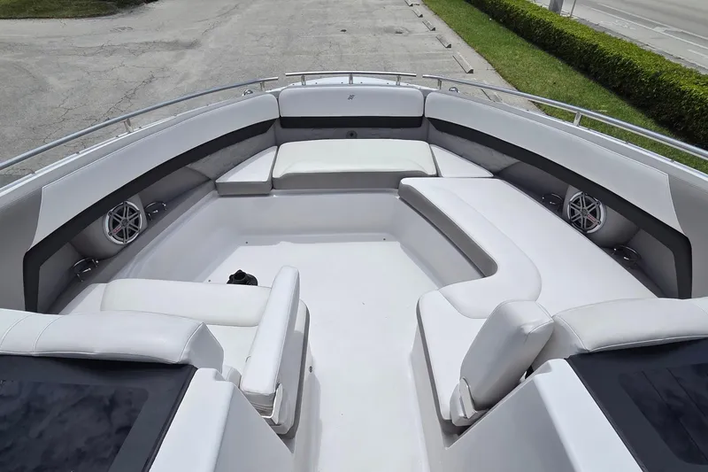 Slide: The Image of Spacious seating area on 2019 Four Winns H350 OB boat deck. - 13