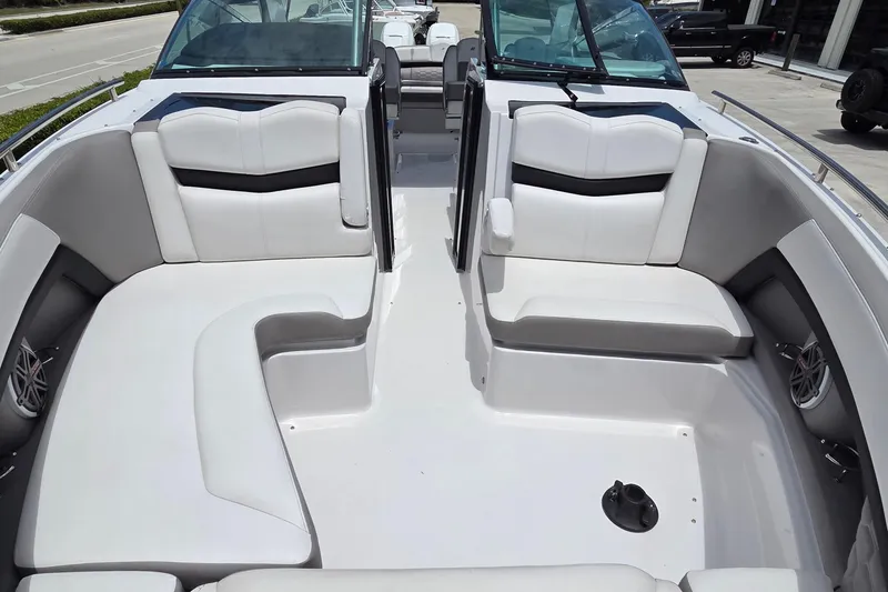 Slide: The Image of 2019 Four Winns H350 OB boat interior with spacious seating and modern design. - 14