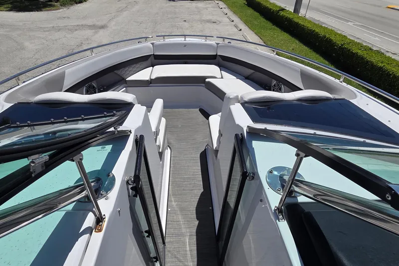Slide: The Image of 2019 Four Winns H350 OB boat interior with spacious seating and sleek design. - 32