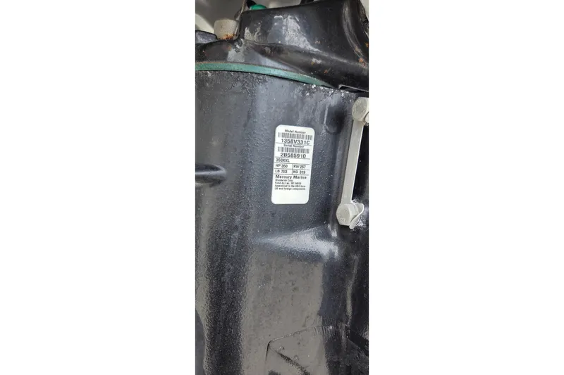 Slide: The Image of Label on a 2019 Four Winns H350 OB boat engine component. - 42