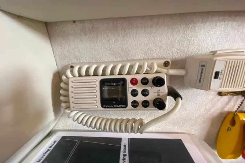 Slide: The Image of Standard Horizon Eclipse radio on 1991 Carver 28 Command Bridge boat. - 30