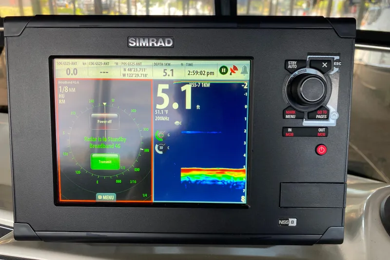Slide: The Image of Simrad marine navigation display on a 1991 Carver 28 Command Bridge boat. - 44