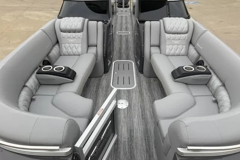 Slide: The Image of Luxurious interior of 2026 Bennington 25 QFBWA pontoon boat with plush seating. - 10