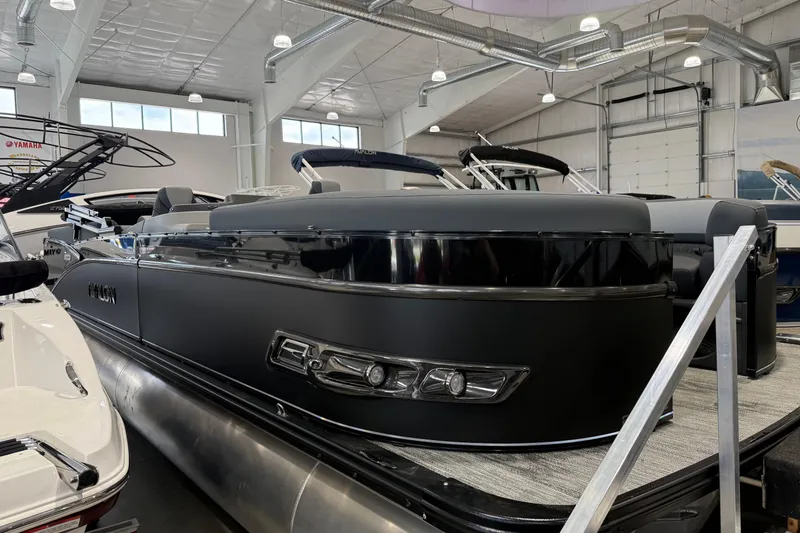 The Image of 2026 Avalon 2585 25 Catalina QL pontoon boat displayed in a showroom. - 1