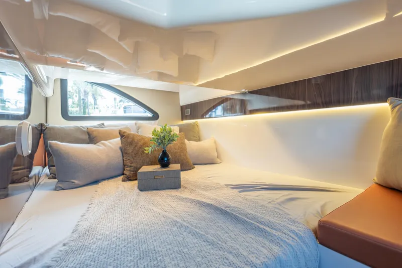 Slide: The Image of Luxurious interior cabin of 2026 Hanover 387 yacht with cozy bedding and elegant decor. - 21