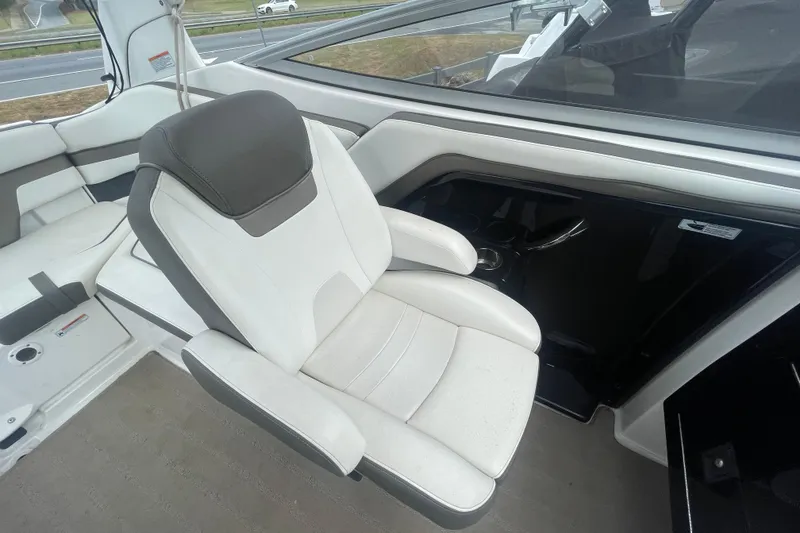 Slide: The Image of 2015 Yamaha Boats 242 Limited S interior with plush seating and modern design. - 12